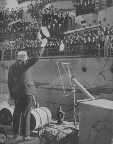 Churchill responds to the cheers from the crew of HMS Prince of Wales 1941
