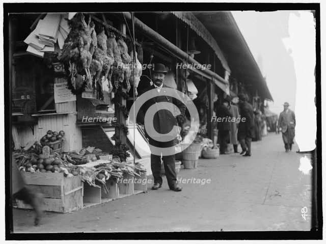 Chaconas Co. Market, P.K., between 1910 and 1921. Creator: Harris & Ewing.