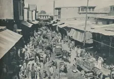 Chaffering Oriental Crowds That Throng The Street Markets c1935. Artist: Charles H Gabriel