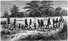 Chained and yoked slaves on the march to the trading station, 1965