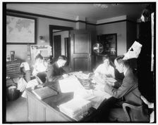Chamber of Commerce telephone room, between 1910 and 1920. Creator: Harris & Ewing