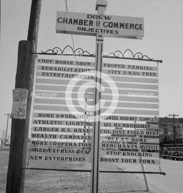 Chamber of Commerce sign, Drew, Mississippi, 1937. Creator: Dorothea Lange.