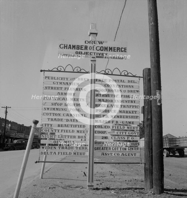 Chamber of Commerce sign, Drew, Mississippi, 1937. Creator: Dorothea Lange.