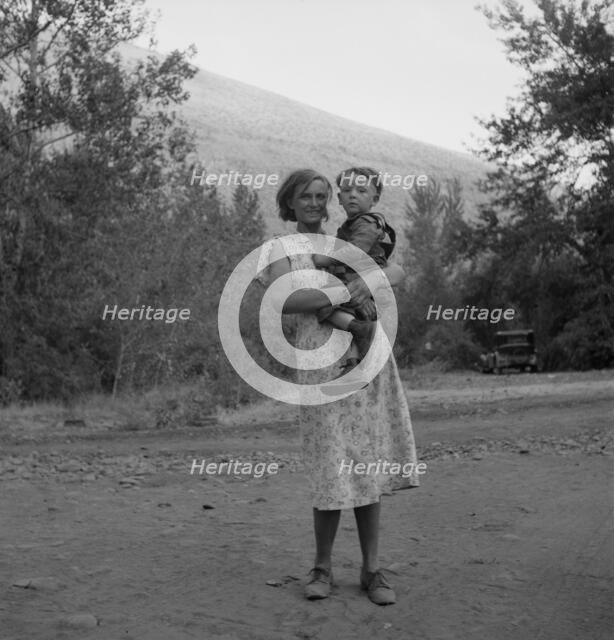 Champion hop picker in squatter camp before the season opens, Washington, Yakima Valley, 1939. Creator: Dorothea Lange.