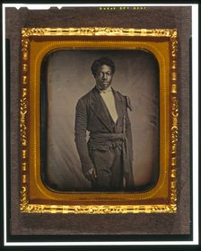 Chancy Brown, three-quarter length portrait, facing front, between 1856 and 1858. Creator: Augustus Washington