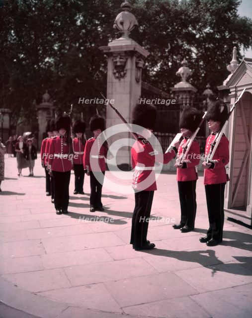 Changing of the Guard, Buckingham Palace, London, c1955. Creator: Arthur Charles Kirby Ware.