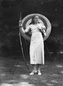Chase, Diana, Miss, doing archery, 1933 June 22. Creator: Arnold Genthe