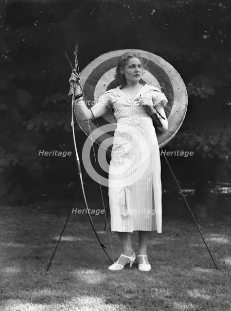Chase, Diana, Miss, doing archery, 1933 June 22. Creator: Arnold Genthe.