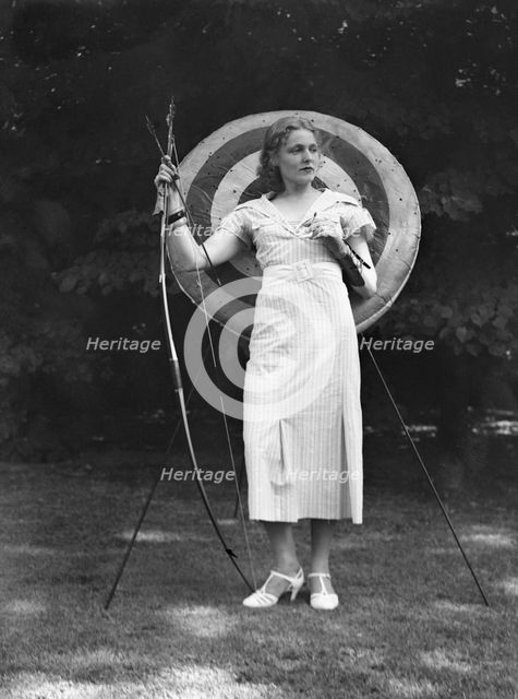 Chase, Diana, Miss, doing archery, 1933 June 22. Creator: Arnold Genthe.