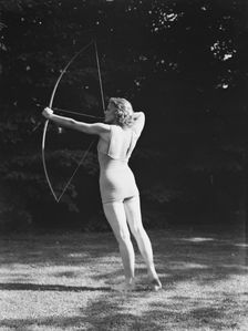 Chase, Diana, Miss, doing archery, 1933 June 22. Creator: Arnold Genthe