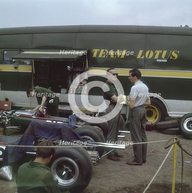 Chapman and Clark outside the Lotus team bus, French Grand Prix, Clermont-Ferrand, France, 1965. Artist: Unknown