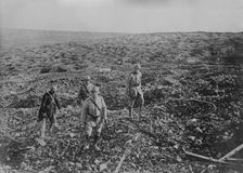 Chaplain & stretcher bearers, France, 27 Aug 1917. Creator: Bain News Service