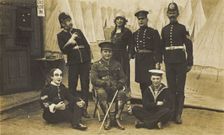 Characters on the set of a play, (between 1910 and 1919?). Creator: Unknown