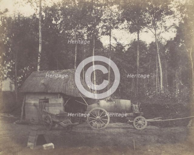 Charette devant l'entrée d'un abri au toit de chaume, 1850-53. Creator: Unknown.