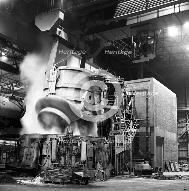 Charging a furnace, Park Gate Iron & Steel Co, Rotherham, South Yorkshire, 1964.  Creator: Michael Walters.