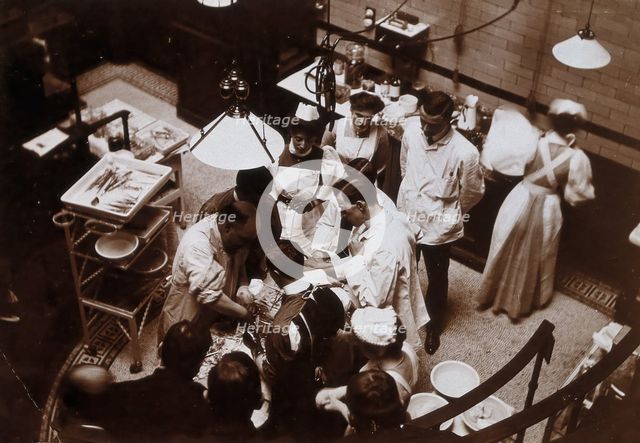 Charing Cross Hospital: Stanley Boyd in the old operating theatre, 1900 (1906). Creator: Unknown.