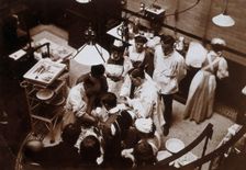 Charing Cross Hospital: Stanley Boyd in the old operating theatre, 1900 (1906). Creator: Unknown