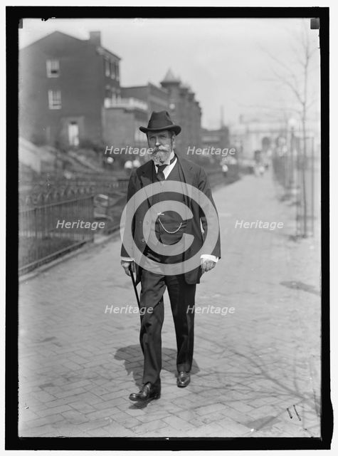 Charles Evans Hughes walking away from Union Station, Washington, D.C..., between 1913 and 1917. Creator: Harris & Ewing.