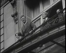 Charles Lindbergh and Anne Morrow Lindbergh On a Balcony Waving To the Press and Crowds, 1927. Creator: British Pathe Ltd