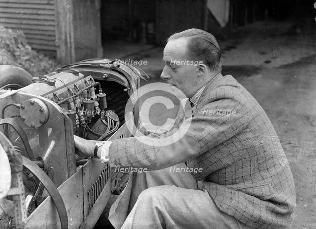 Charles Mortimer working on the engine of a MG KN Special, c1930s Artist: Bill Brunell.