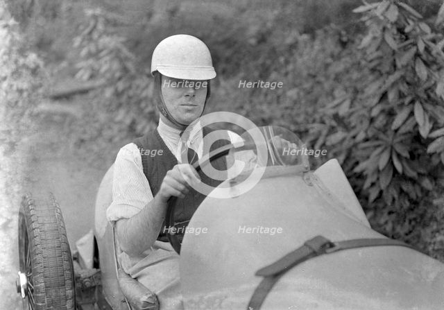 Charles Mortimer behind the wheel of an offset-bodied single-seater MG KN Special, c1930s Artist: Bill Brunell.