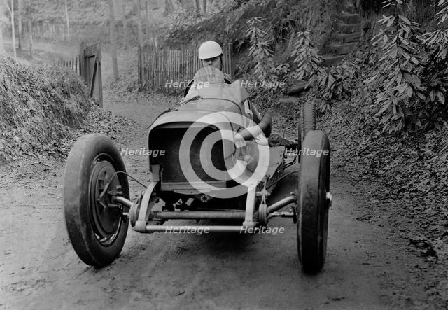 Charles Mortimer driving an offset-bodied single-seater MG KN Special, c1930s Artist: Bill Brunell.