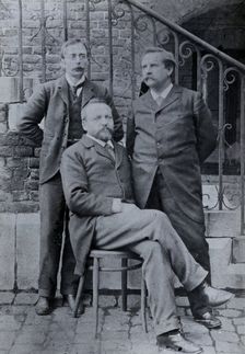 Charles Sherrington (left), Leon Fredericq (seated) and Paul Grützner (right) outside the...(1940?). Creator: Unknown