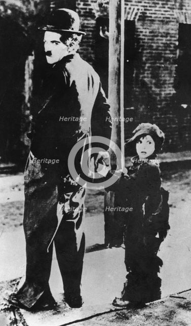 Charlie Chaplin and Jackie Coogan in 'The Kid', 1921. Creator: Unknown.