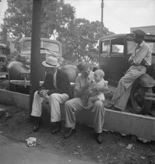 Chatham County farmers in town on Saturday afternoon, Pittsboro, North Carolina, 1939. Creator: Dorothea Lange