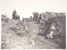 Chaumieres en Auvergne, avec un calvaire, 1852, printed 1978. Creator: Edouard Baldus