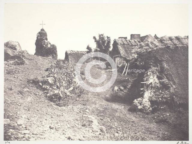 Chaumieres en Auvergne, avec un calvaire, 1852, printed 1978. Creator: Edouard Baldus.