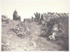 Chaumieres en Auvergne, avec un calvaire, 1852, printed 1978. Creator: Edouard Baldus