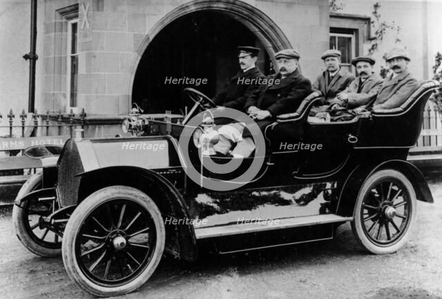Chauffeur Charlie Keith at the wheel of a Humber, c1907. Artist: Unknown