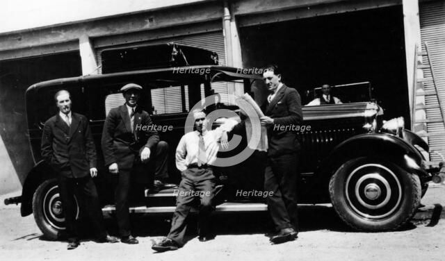 Chauffeurs with a Minerva, France. Artist: Unknown