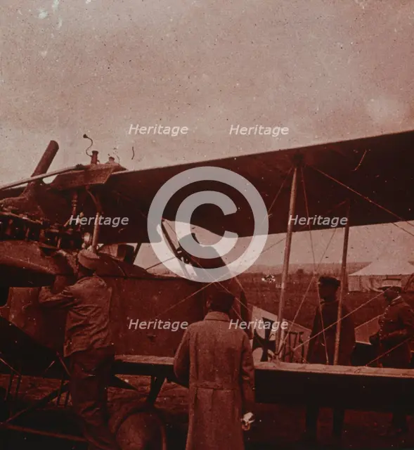 Checking aircraft with the pilot, 1916. Artist: Unknown.