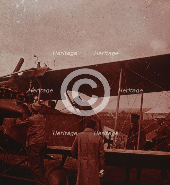 Checking aircraft with the pilot, 1916. Artist: Unknown.
