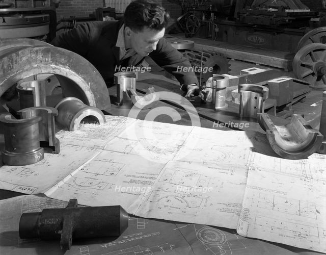 Checking finished castings at AT Green & Sons Ltd foundry, Rotherham, South Yorkshire, 1963. Artist: Michael Walters