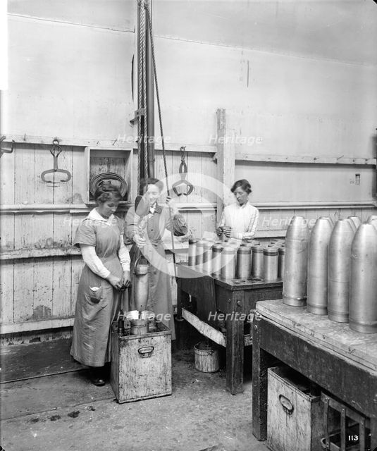 Checking Shells, Cunard Shell Works, Birkenhead, Merseyside, 1917.  Artist: Bedford Lemere and Company