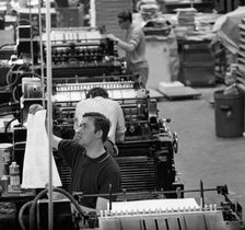 Checking print, the White Rose Press, Mexborough, South Yorkshire, 1968. Creator: Michael Walters