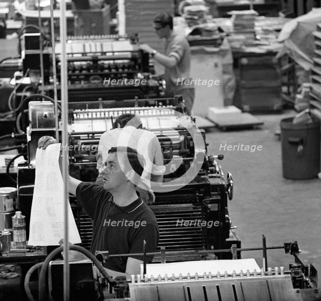 Checking print, the White Rose Press, Mexborough, South Yorkshire, 1968. Creator: Michael Walters.