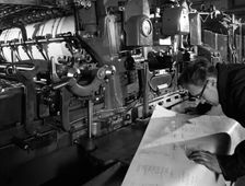 Checking printed pages from a two colour press, Mexborough, South Yorkshire, 1959. Creator: Michael Walters