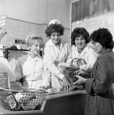 Checkout girls at a supermarket opening, Brough's Ltd, Thurnscoe, South Yorkshire, 1963. Creator: Michael Walters