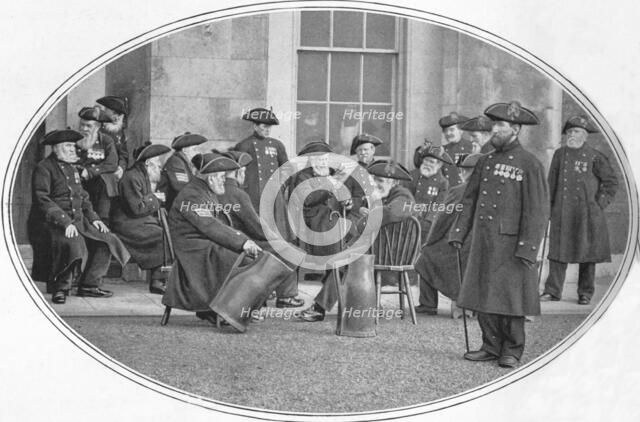 Chelsea Pensioners with 'black jacks', London, c1901 (1901). Artist: Unknown.