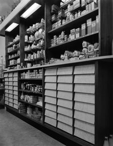 Chemist's shop interior, Armthorpe, near Doncaster, South Yorkshire, 1961. Creator: Michael Walters