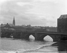 Chester weir and Old Dee Bridge on River Dee with Chester Cathedral in the background, 1902. Creator: Robert Augustus Henry L'Estrange