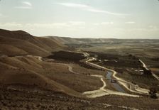 Cherry orchards and irrigation ditch, Emmett, Idaho, 1941. Creator: Russell Lee