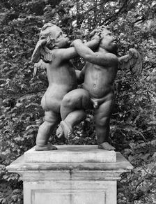 Cherubs - the Quarrel statue in the gardens of Melbourne Hall, Derbyshire, 1954. Artist: GB Mason