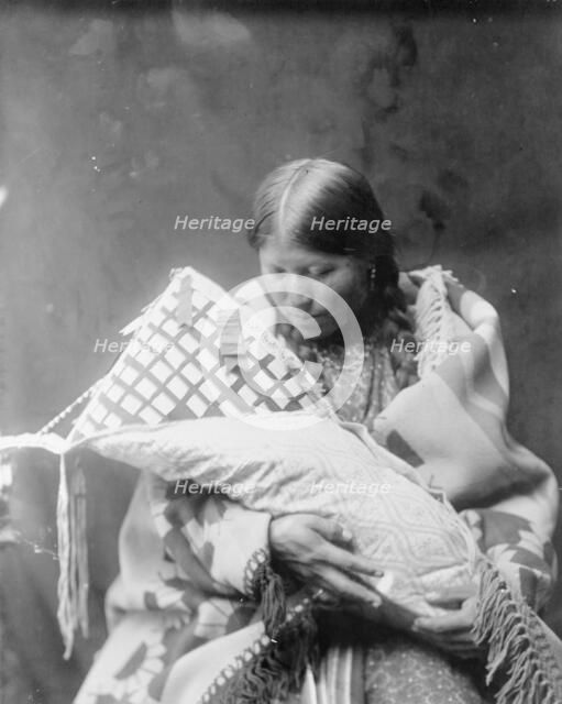 Cheyenne mother and child, c1905. Creator: Edward Sheriff Curtis.
