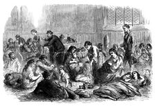 Chicago after the Fire: burnt-out people in the chapel of Grace Church, 1871. Creator: Unknown