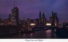 Chicago River and city skyline at night, Illinois, USA, 1957